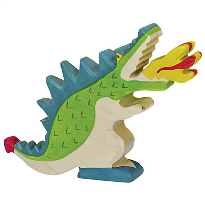 Colorful toy alligator with a blue background