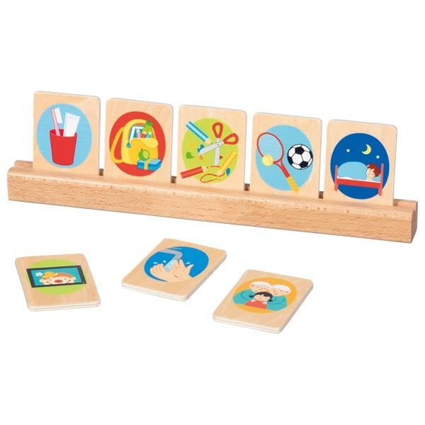 Wooden educational toy with colorful cards and a holder on a white background