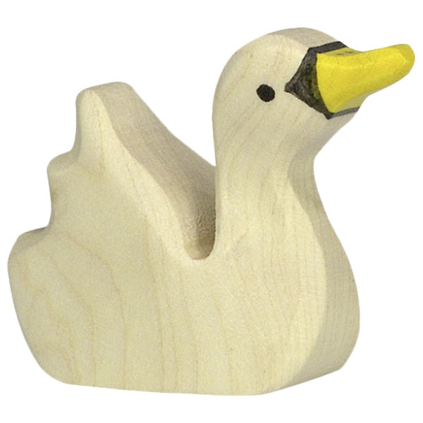 Wooden baby swan figure on a white background