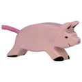 Pink pig figurine on a white background
