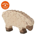 Wooden sheep toy with puzzle pieces on a white background, featuring the 'spiel gut' logo.