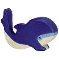 Wooden toy whale with blue and beige colors on a white background