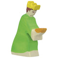 Wooden figurine of a character in a green robe and yellow hat on a white background